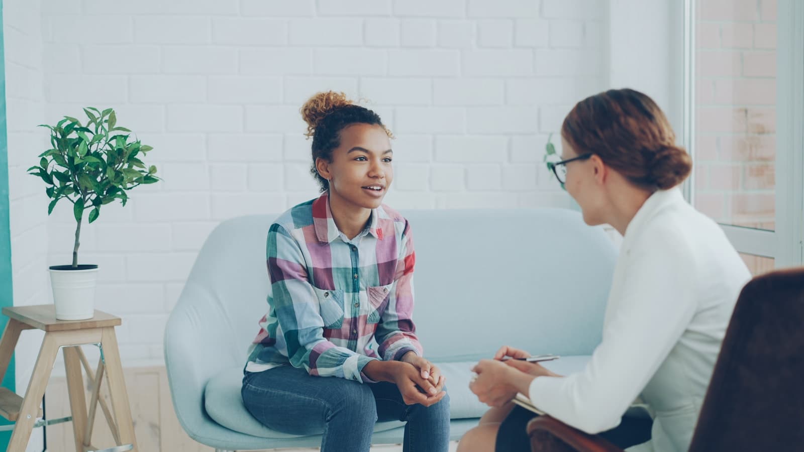 A counsellor talking through career options with a student