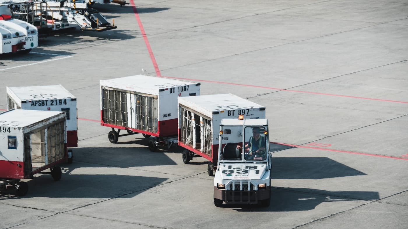 Ground handling equipment and baggage carts on the tarmac